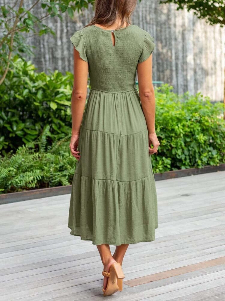 FAITH - Elegant klänning med rund halsringning