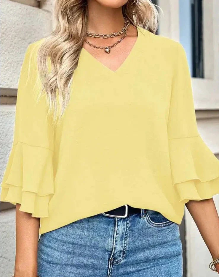 Elegant halvärmad blus med volanger för kvinnor