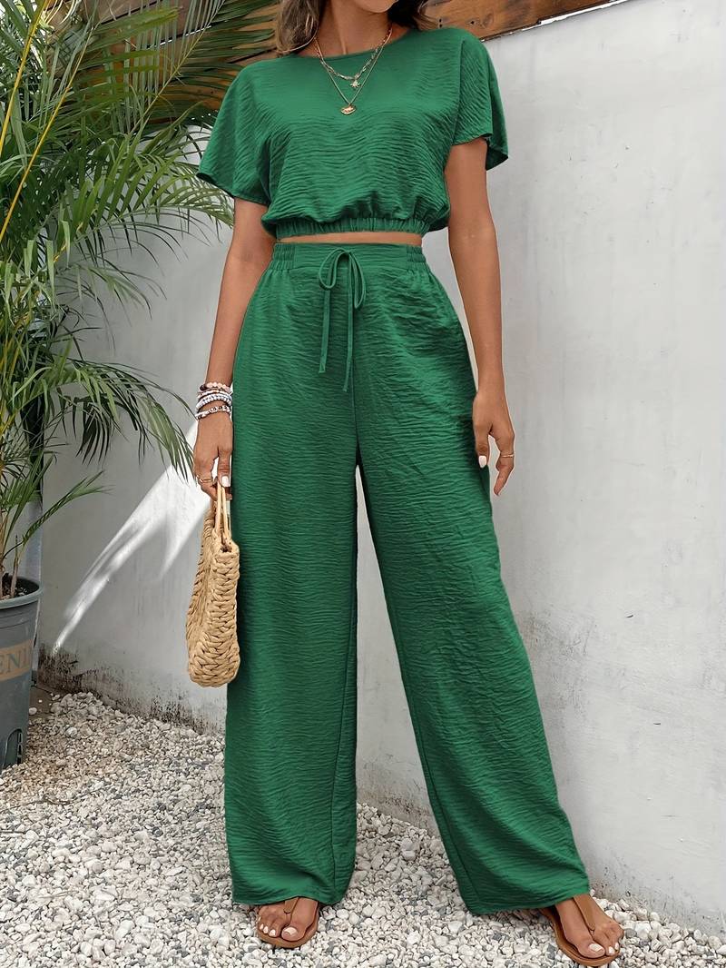 Chic crop top T-shirt och höga midje-byxor för kvinnor