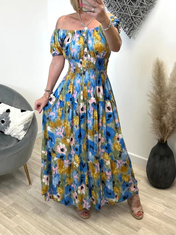 Färgglad blommig off-shoulder klänning