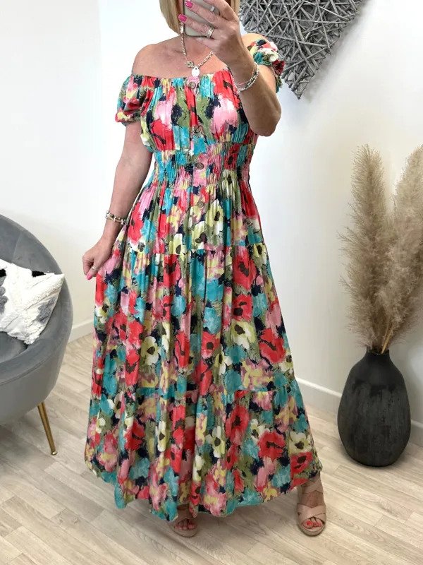 Färgglad blommig off-shoulder klänning