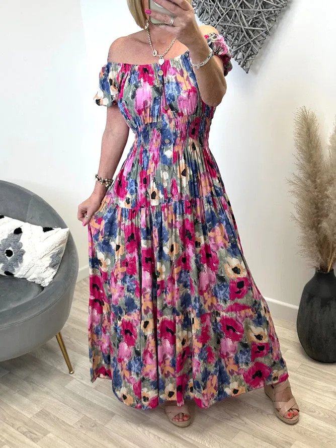 Färgglad blommig off-shoulder klänning