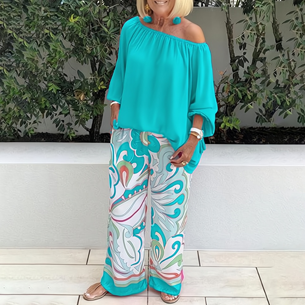 Off-shoulder blus och byxor med snyggt tryck set för kvinnor