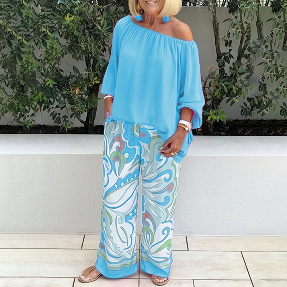 Off-shoulder blus och byxor med snyggt tryck set för kvinnor