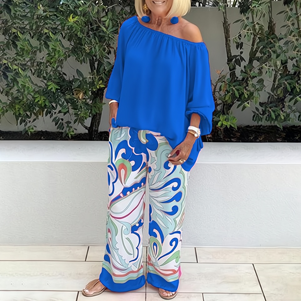 Off-shoulder blus och byxor med snyggt tryck set för kvinnor