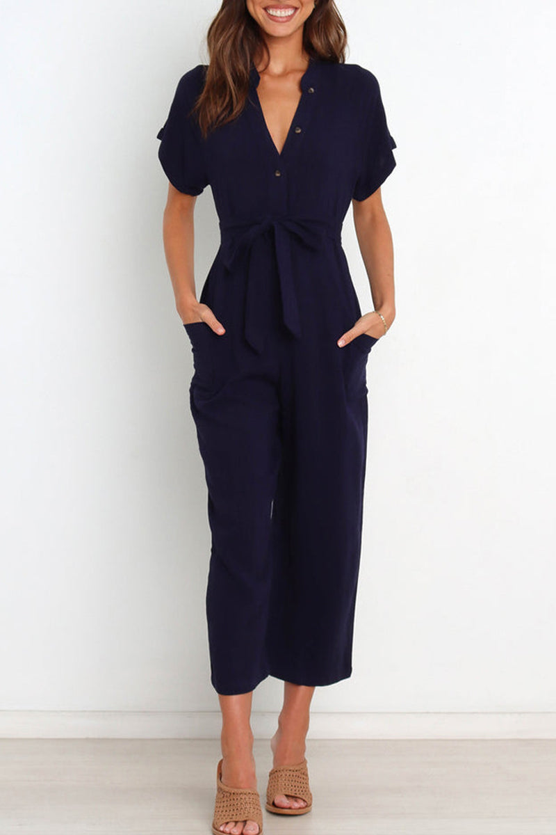 Elegant kortärmad V-ringad knappförsedd jumpsuit med bälte för kvinnor