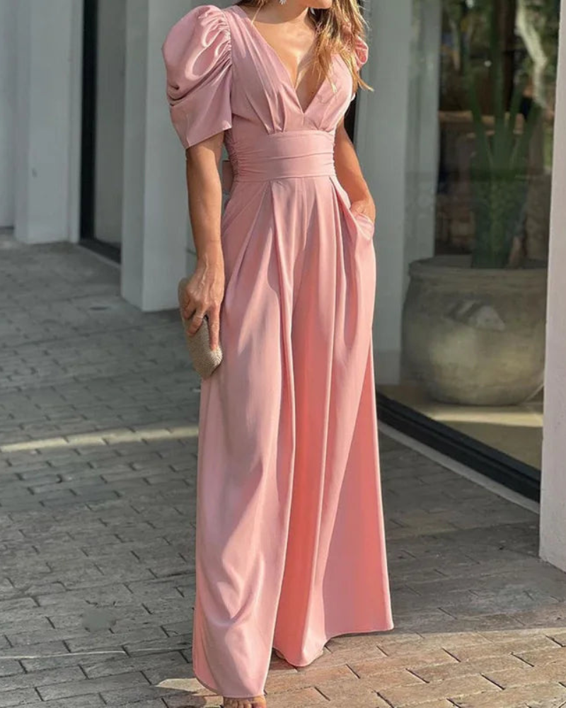 Elegant djup V-ringad jumpsuit med puffärmar och vida ben för kvinnor