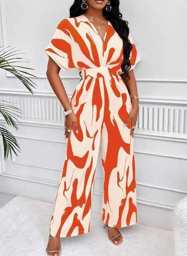 Elegant abstrakt V-ringad jumpsuit för kvinnor