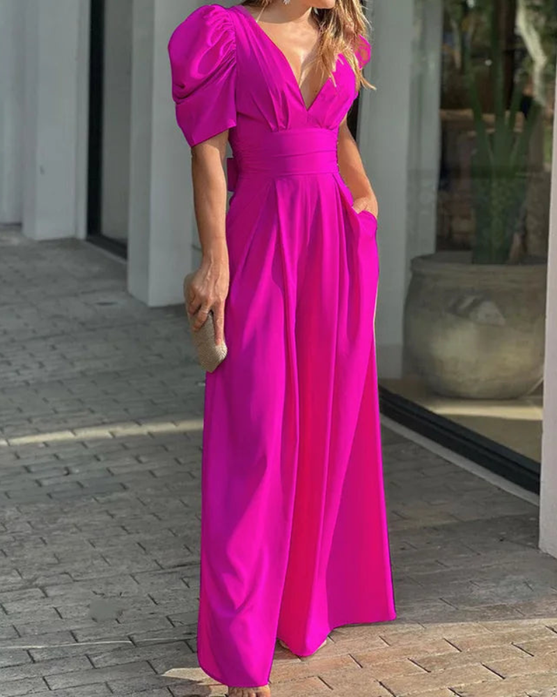 Elegant djup V-ringad jumpsuit med puffärmar och vida ben för kvinnor