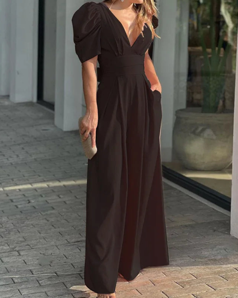 Elegant djup V-ringad jumpsuit med puffärmar och vida ben för kvinnor