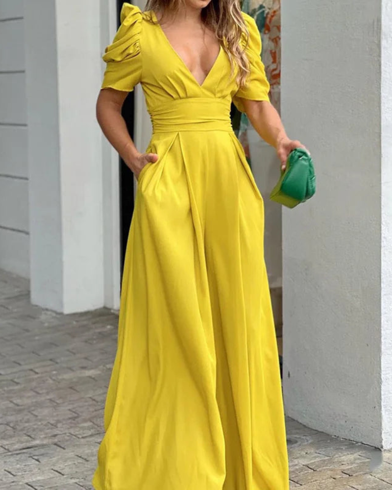 Elegant djup V-ringad jumpsuit med puffärmar och vida ben för kvinnor