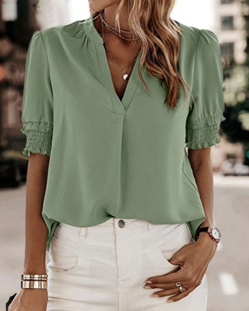 Elegant V-ringad blus för kvinnor