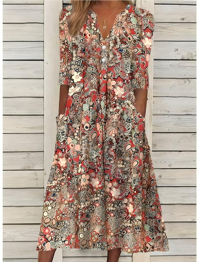 Elegant färgglad blommig sommarklänning