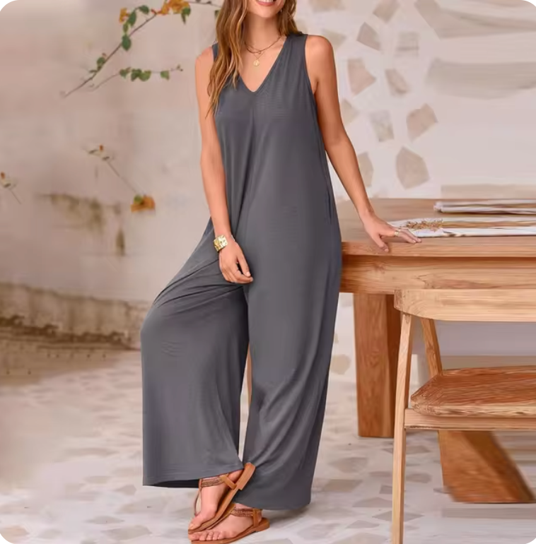 Avslappnad ärmlös jumpsuit med vida ben för kvinnor