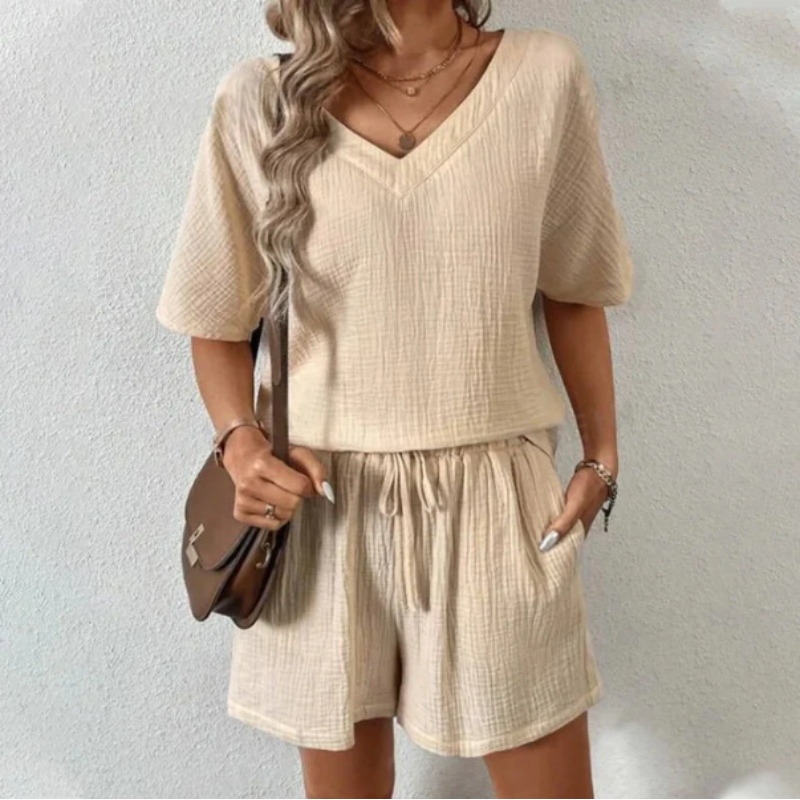 V-ringad blus och kort elegant sommarset för kvinnor