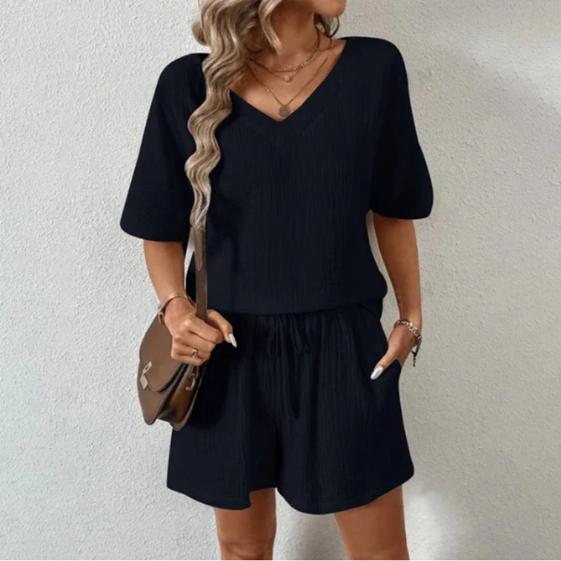 V-ringad blus och kort elegant sommarset för kvinnor