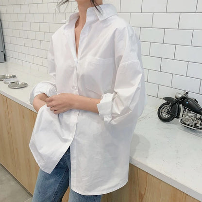 Elegant långärmad vit blus för kvinnor