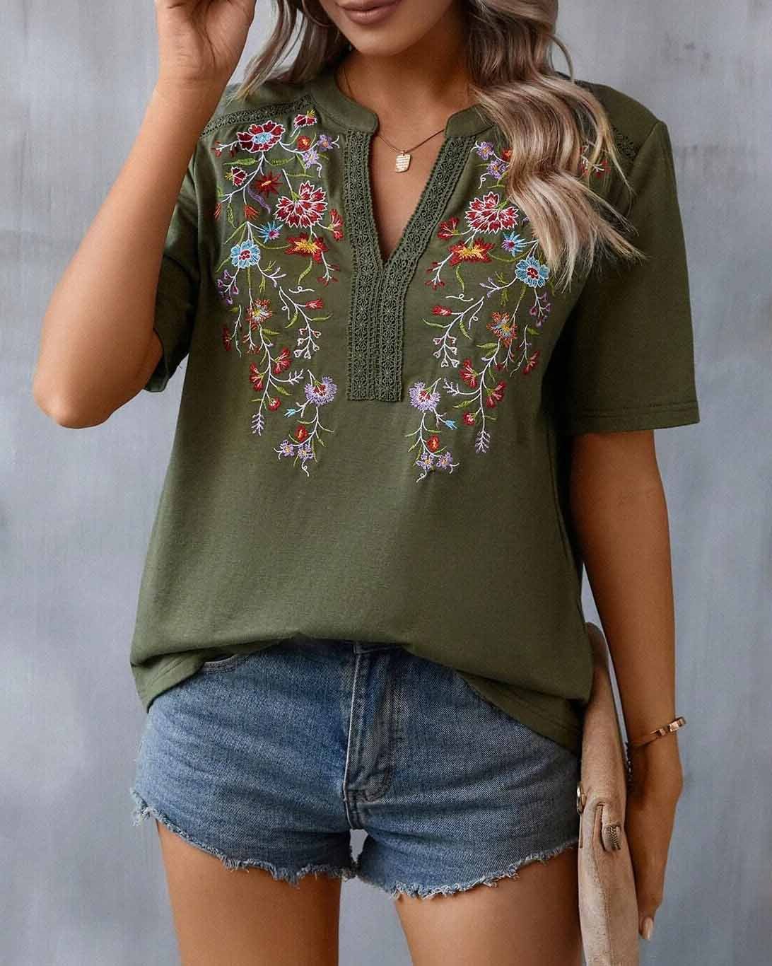 Broderad blommig blus för kvinnor