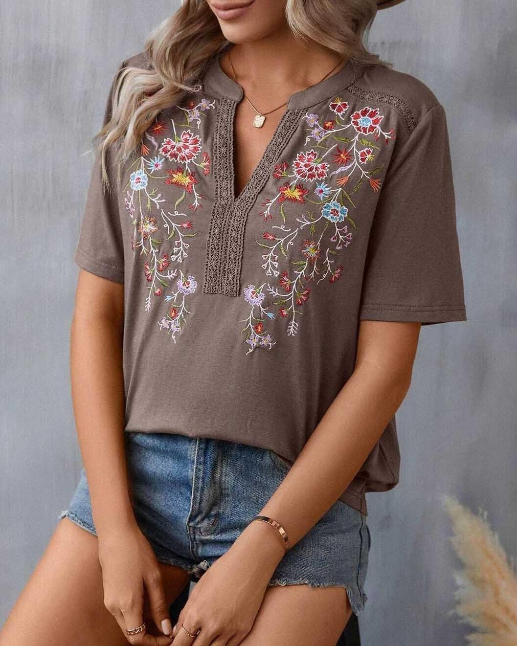 Broderad blommig blus för kvinnor