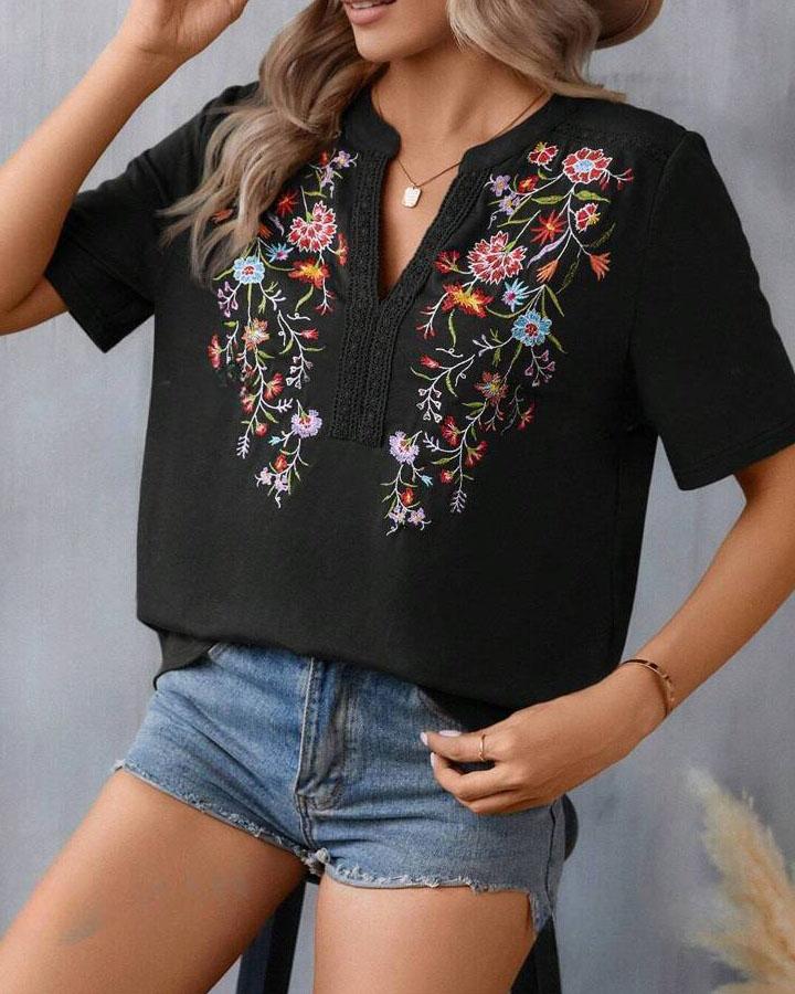 Broderad blommig blus för kvinnor