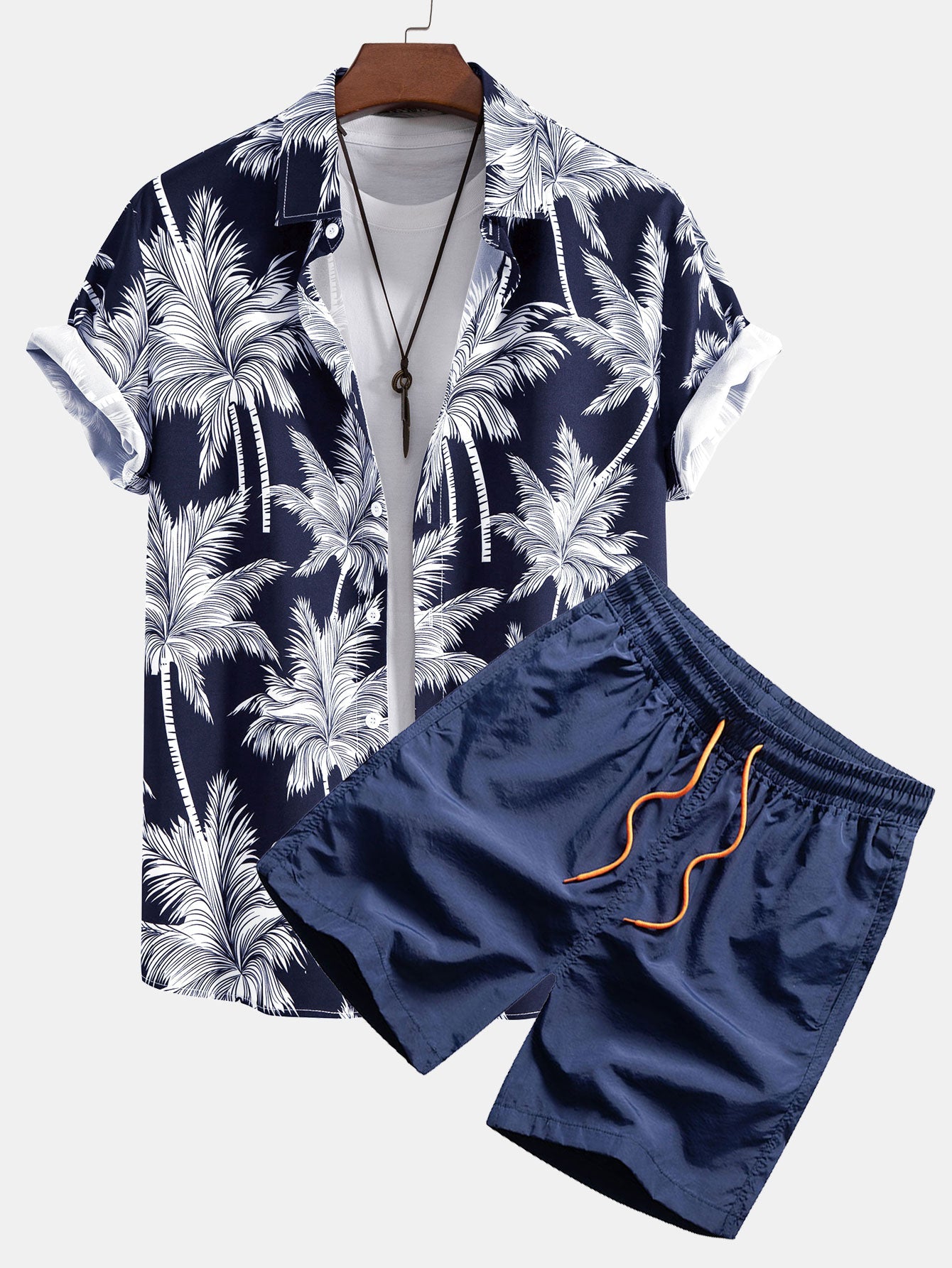Skjorta med knappar och badshorts med palmträdstryck