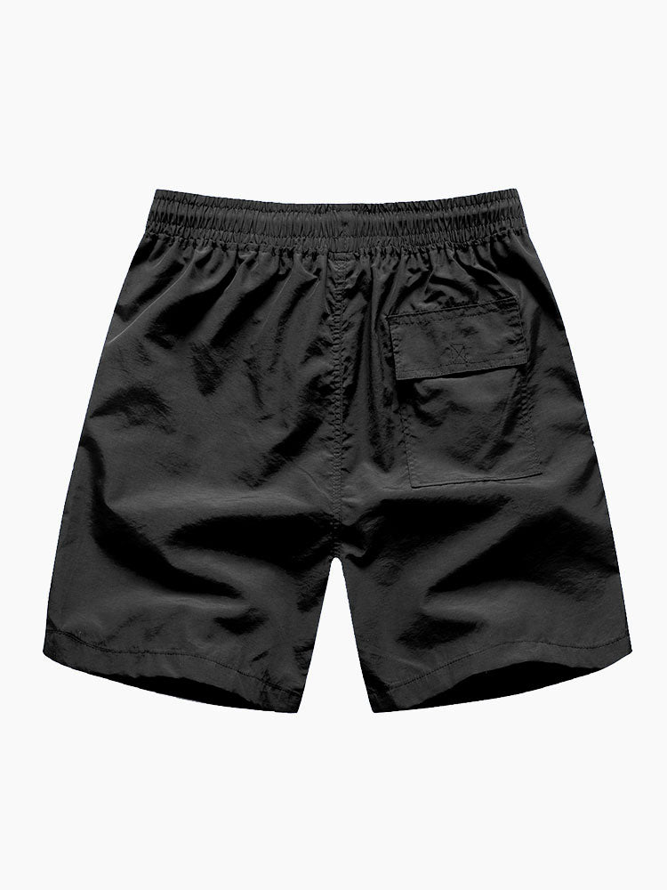 Skjorta med knappar och badshorts med palmträdstryck