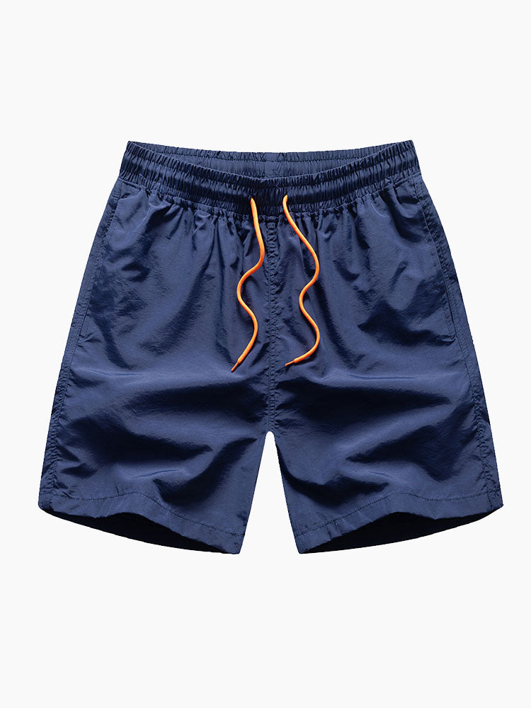 Skjorta med knappar och badshorts med palmträdstryck