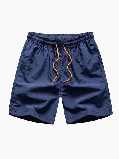 Skjorta med knappar och badshorts med palmträdstryck
