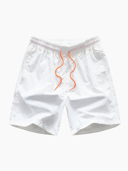 Skjorta med knappar och badshorts med palmträdstryck